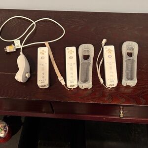 Nintendo Wii Controllers and Nunchuk in White